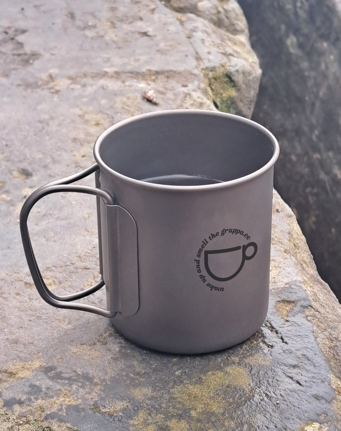 Titanium travel mug.